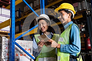 Female warehouse worker working at the storehouse