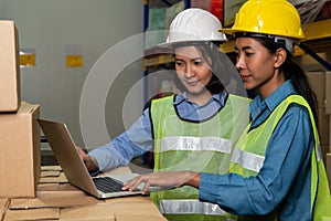 Female warehouse worker working at the storehouse