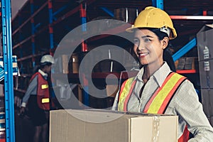 Female warehouse worker working at the storehouse