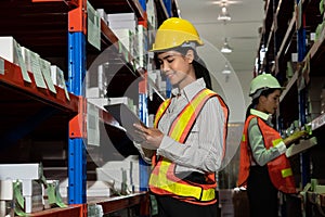 Female warehouse worker working at the storehouse