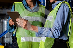 Female warehouse worker working at the storehouse