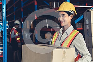 Female warehouse worker working at the storehouse