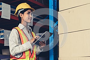 Female warehouse worker working at the storehouse