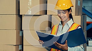 Female warehouse worker working at the storehouse