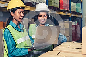 Female warehouse worker working at the storehouse