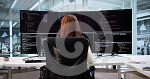 Female Web Developer Coding On Computer To Develop Code
