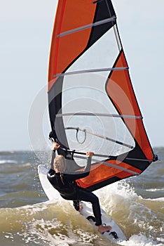 Female windsurfing photo