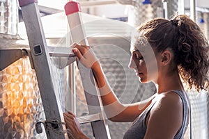 Female winemaker controls the quality of wine