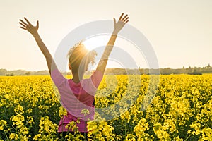 Female Woman Athlete Runner Celebrating In Yellow Flowers