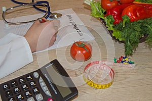 Female, Woman nutritionist holding fresh vegetables and fruit: healthcare and healthy vegetarian diet concept