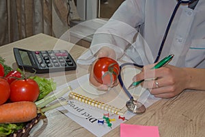 Female, Woman nutritionist holding fresh vegetables and fruit: healthcare and healthy vegetarian diet concept