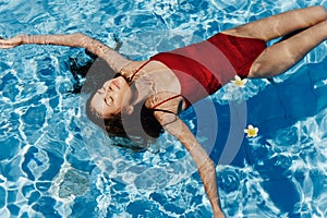 Female woman travel young bikini pool blue summer vacation body water person swimwear beauty