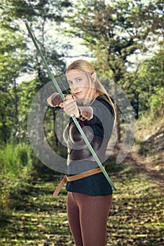 female wood elf shooting a bow
