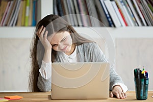 Female worker annoyed receiving additional work