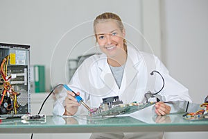 Female worker assembler posing