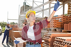 Female worker calling out for someone