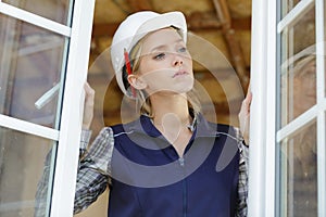 female worker checking window