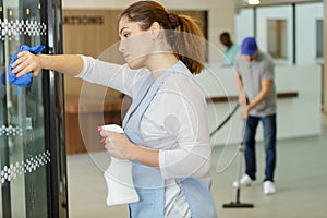 female worker cleaning services in hospital