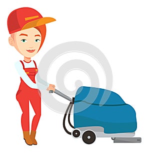 Female worker cleaning store floor with machine.