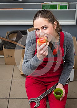 Female worker while coffee break