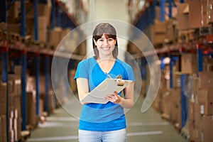 Female Worker In Distribution Warehouse