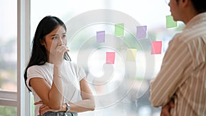 Female worker feeling upset and sad after she was complained by her boss