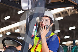 Female worker on forklift, Manual workers working in warehouse, Worker driver at warehouse forklift loader works