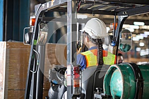 Female worker on forklift, Manual workers working in warehouse, Worker driver at warehouse forklift loader works