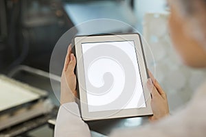 Female Worker Holding Digital Tablet at Food Factory Close Up