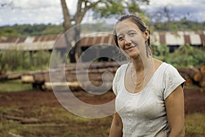 Female worker in lumberyard