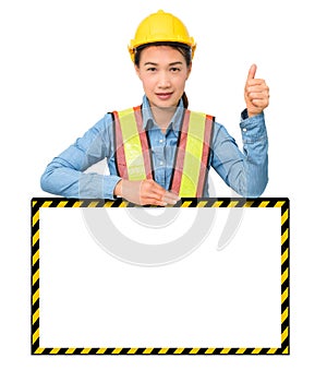 Female worker with Protection Equipment, posing behind big white