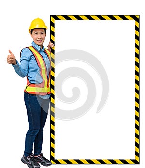 Female worker with Protection Equipment, posing side of big whit