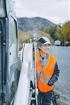 Female worker road construction