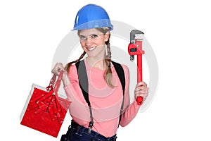 Female worker with a toolbox.