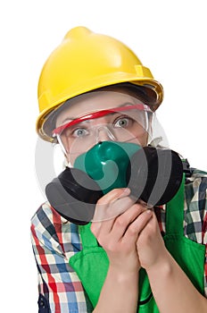 Female worker wearing coverall and gas mask