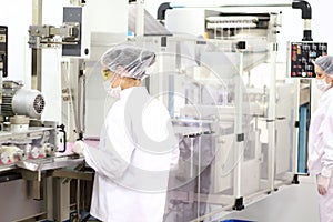 Female Workers At Pharmaceutical Factory photo