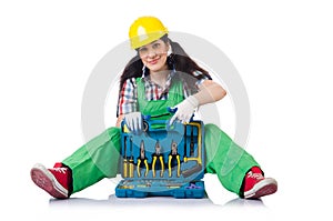 The female workman in green overalls isolated on