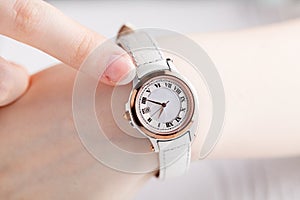 Female wrist warch on arm