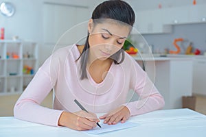 Female writing a letter