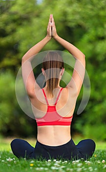 Female Young Fit Healthy Woman or Girl Practicing Yoga Outside