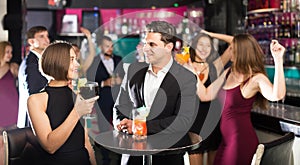 Females and males celebrating corporate