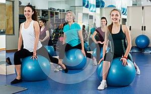 Females working out with aerobic ball