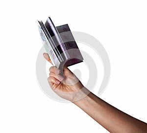 A femalewoman hand hold a emptyblank bookdiary, note cover isolated white photo