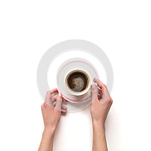 Femalewoman hand hold a white espresso cup with coffee isolate photo