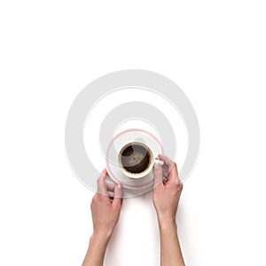 Femalewoman hand hold a white espresso cup with coffee isolate photo