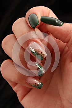 Feminine decorated nails with green colors