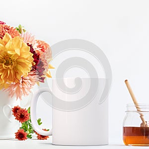 Feminine floral White Mug Mockup, white coffee mug next to Dahlias and honey pot. Perfect for businesses selling mug mockups