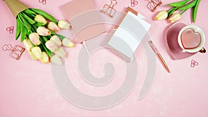 Feminine pink desktop workspace blog header overhead flat lay.