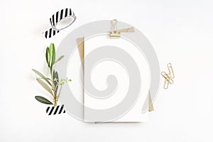 Feminine stationery, desktop mock-up scene. Blank greeting card, craft envelope, washi tape and golden paper, binder