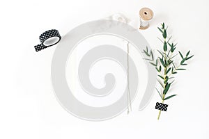 Feminine stationery, wedding desktop mock-up scene. Blank greeting card, envelope,black washi tape, silk ribbon and